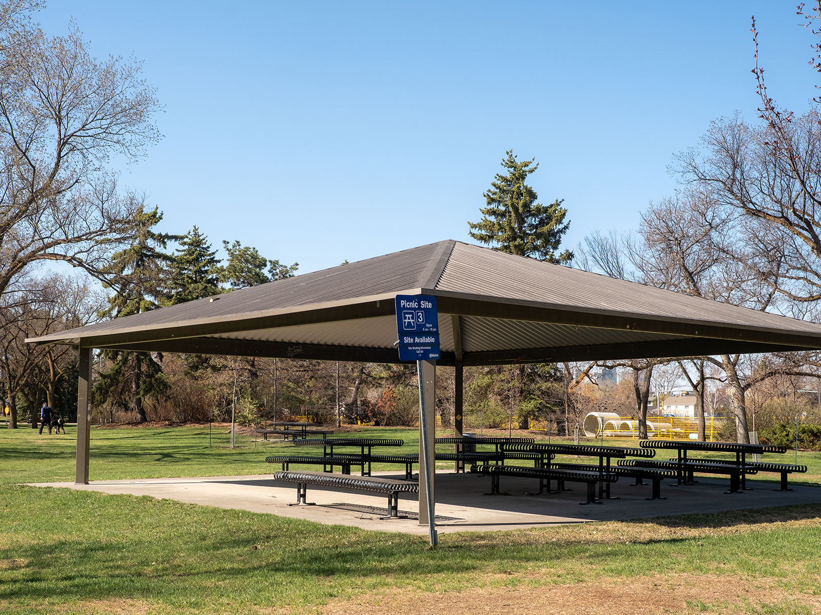 Large, bookable picnic site with canopy and several tables