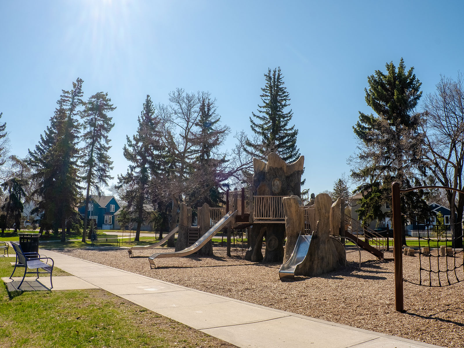 Playground with wooden slide equipment