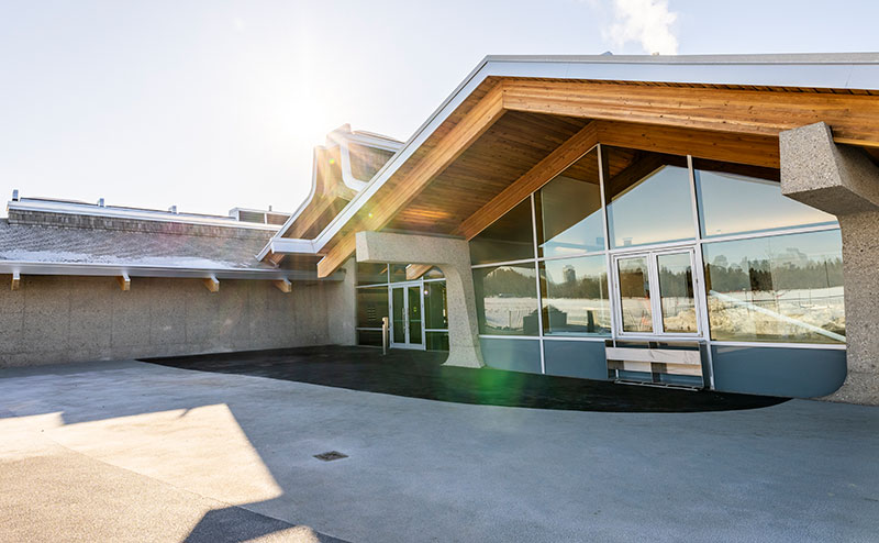 Light shining over exterior of the Main Pavilion building
