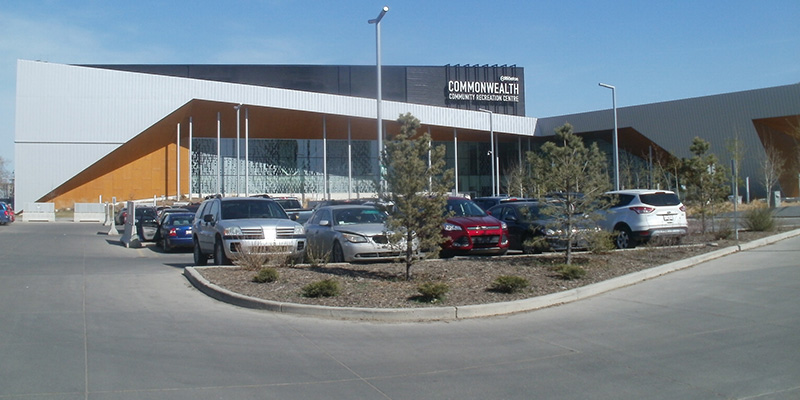 A graded parking lot in front of Commonwealth Recreation Centre