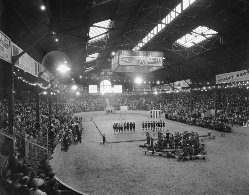 Black and white photo of the Grads and a St. Louis team in an arena.