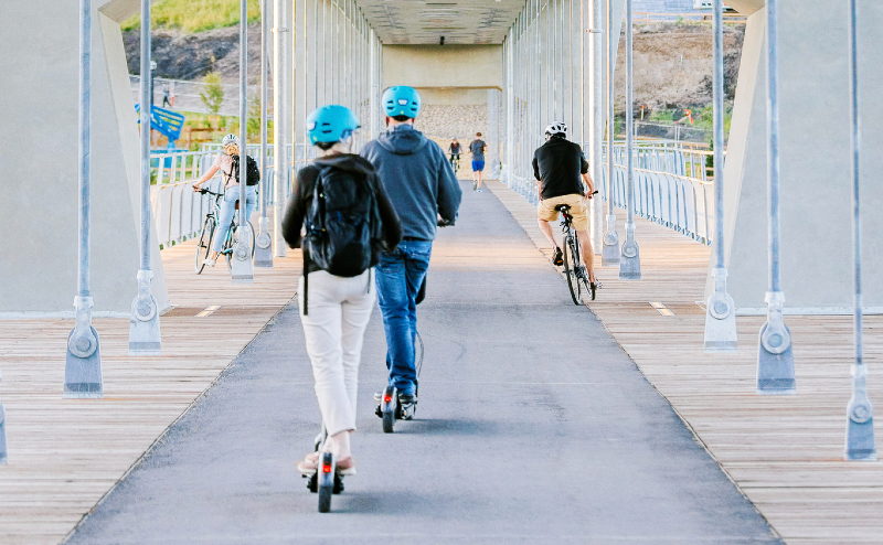 Scooters on bridge